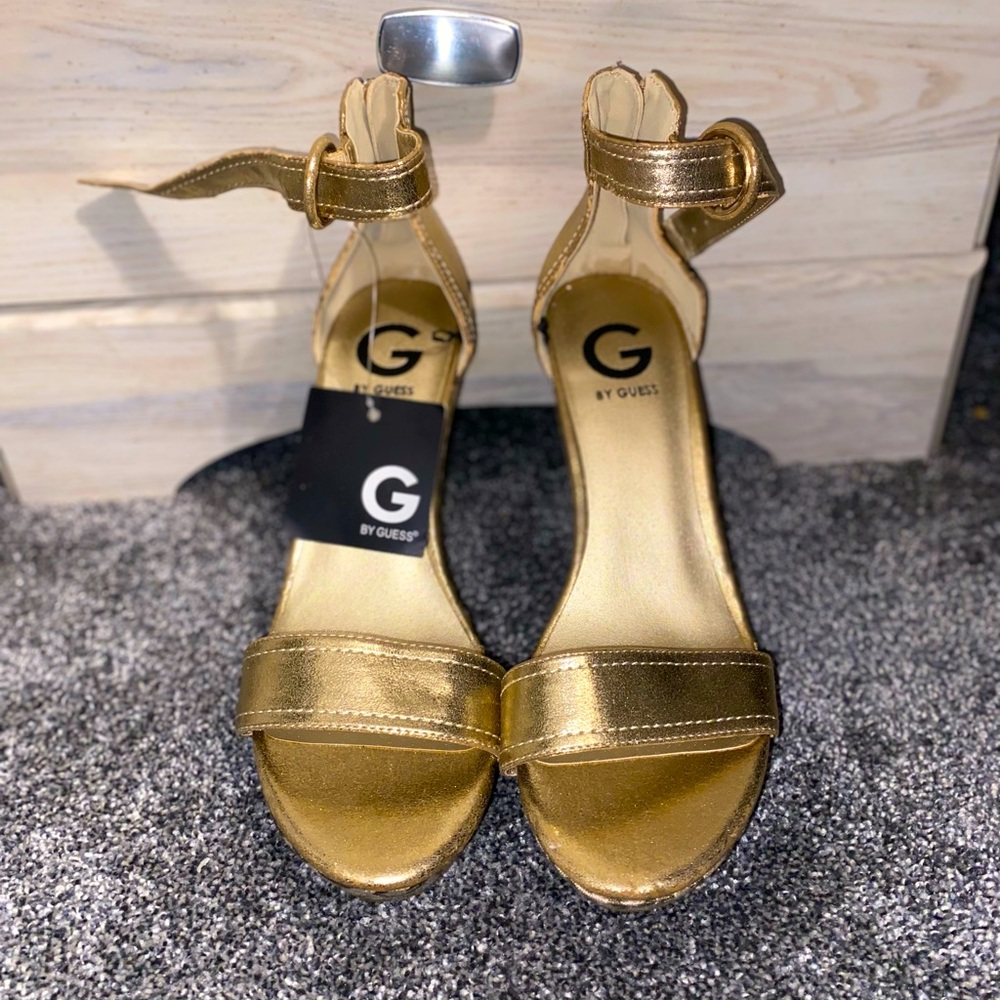 Gold Guess women’s wedge heels with tags